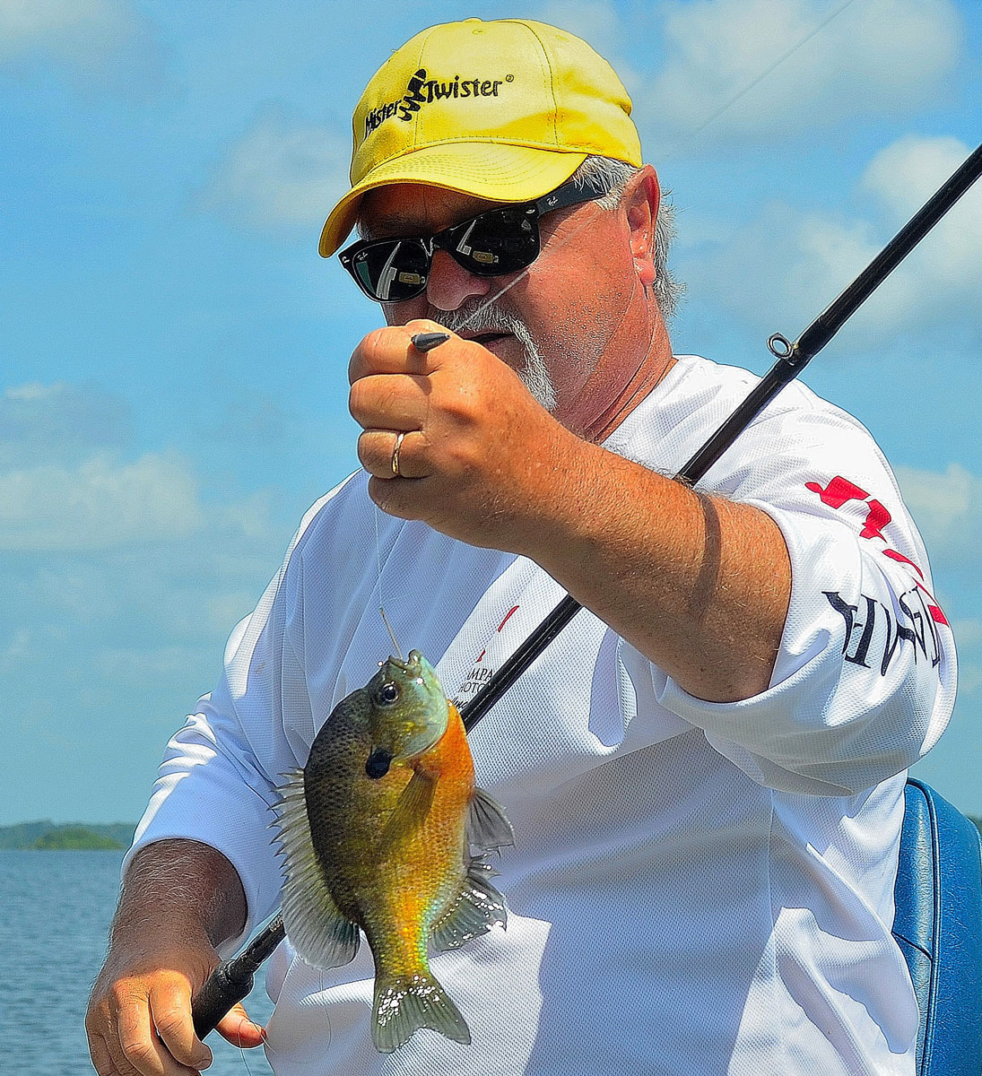 In July, bream begin suspending in schools above the crappie on brushpiles and other natural structure located along the main channel. These can be taken in good numbers tightlining a weighted cricket to the depths.