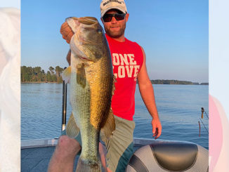 Brett Preuett landed this whopping 8-pound + lunker on a recent “day off” from his fishing job on Caney.