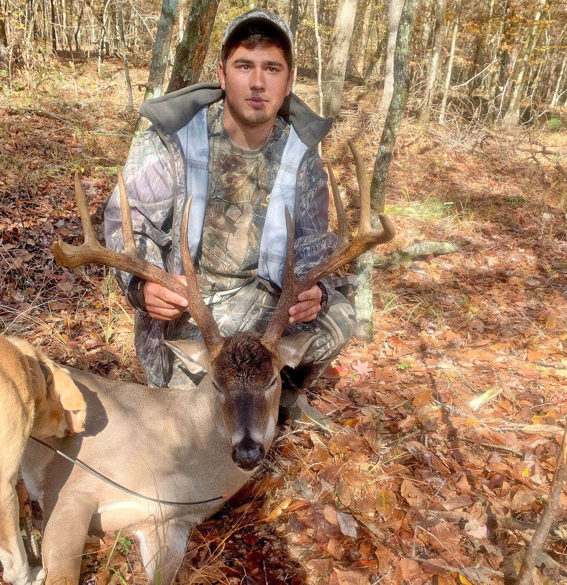 Cole Henry and his giant 160-inch Grant Parish 9-point buck.