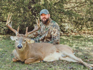 Rick Guillot of Elm Grove with the 12-point, 155-inch buck he killed near Loggy Bayou in Red River Parish.