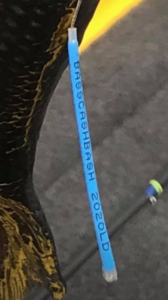 This blue tag signifies a winning fish in the 2020 BassCashBlast. it includes a phone number that anglers can call when they catch a tagged fish.