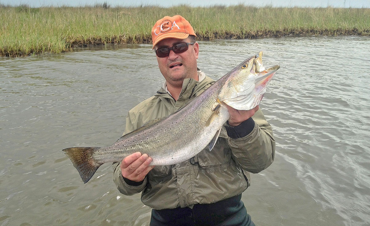 Jason Ellender of Sulphur displays his monster speckled trout that weighed 10.65 pounds taken March 23, 2013, on the Louisiana side of Sabine Lake. It is the current No. 8 in Louisiana gamefish records. (Photo courtesy of Jason Ellender)
