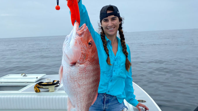 Kaitlin Kopsco with a red snapper caught out of Port Fourchon on July 4.