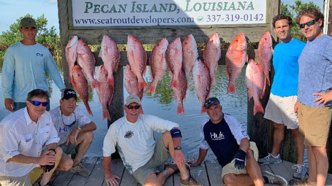 Wayne Henry and crew after a snapper trip out of Pecan Island.