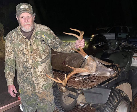Mike Chandler and his Lincoln Parish 8-point buck.