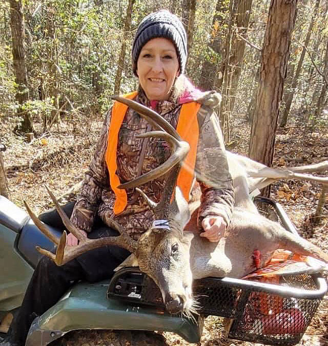 Kelly Downey took this big 10-point buck at Little Cypress Creek hunting club in north Bossier Parish on Nov. 15.