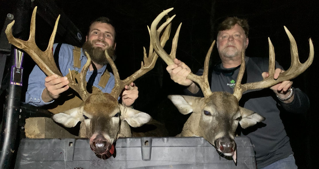 Lee Sullivan (left) with his 150-inch brute and Kenny Sullivan with his a 140-inch, 8-point buck.