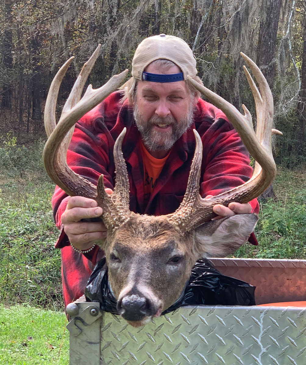 Ray Mangrum’s son, Sam, used his phone to bring in the big 14-point buck.