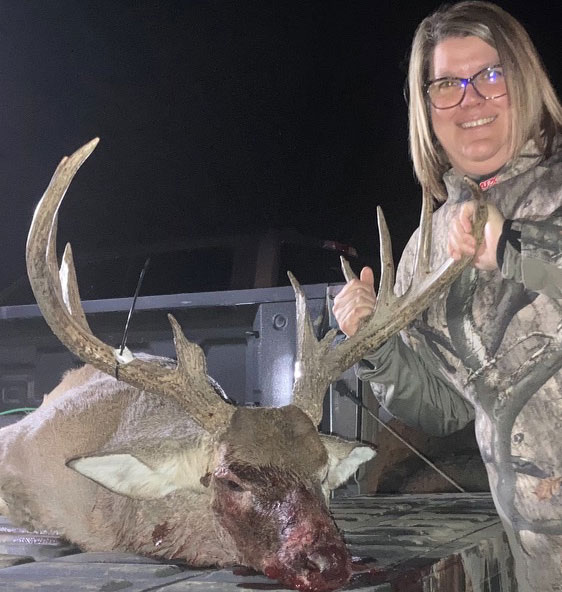 When Kim Greer saw the big buck's full rack, she knew it met her hunting club's age limit.