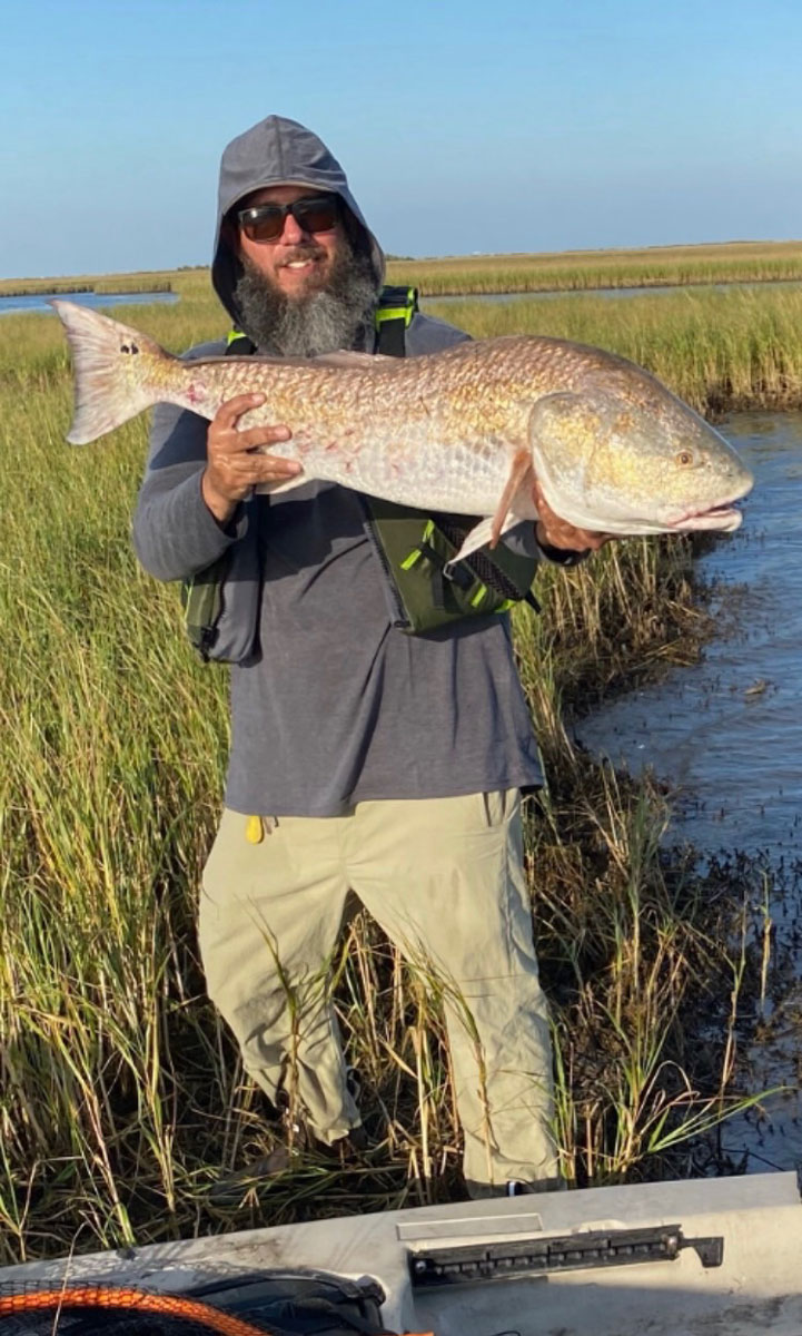 This whopper redfish caught by Phillip Logan was landed by sneaking up on the fish in a kayak.