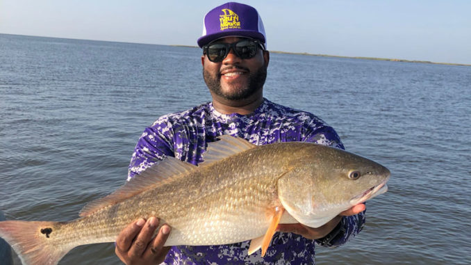 This huge redfish seems to prove Brent Taylor’s point that when you look good, you fish good.