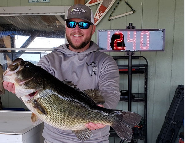 Ben Raley and his 12.40-pound Caney Lake lunker that hit a red Rat-L-Trap on Jan. 30.