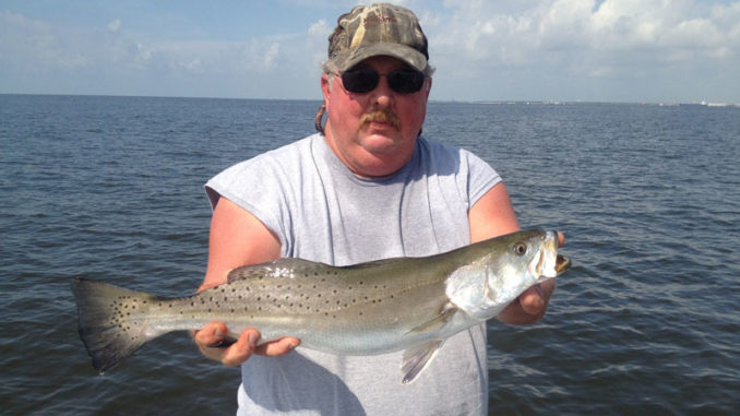 Charlie Shaw has caught his fair share of fish on Sabine Lake. Here he is with a solid summer specimen.