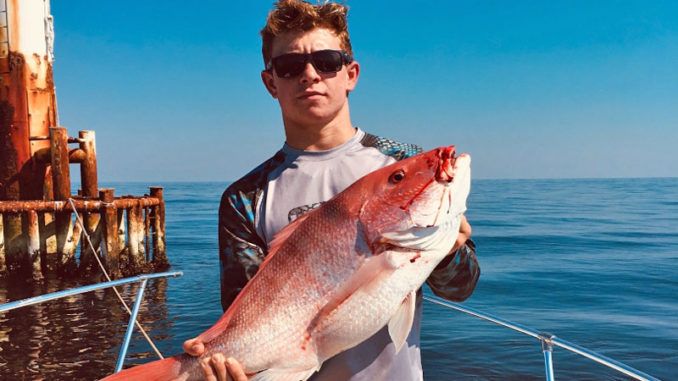 Sal Guagliardo with a 34-inch red snapper caught out of Grand Isle.