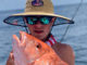 Ethan Defelice with a red snapper that he caught while fishing the SMI blocks with his uncle, Brett Adams.