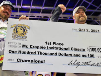 Winners Jeff Larch and Jared Fyock of Arkansas with their $100,000 Crappie Classic championship check.