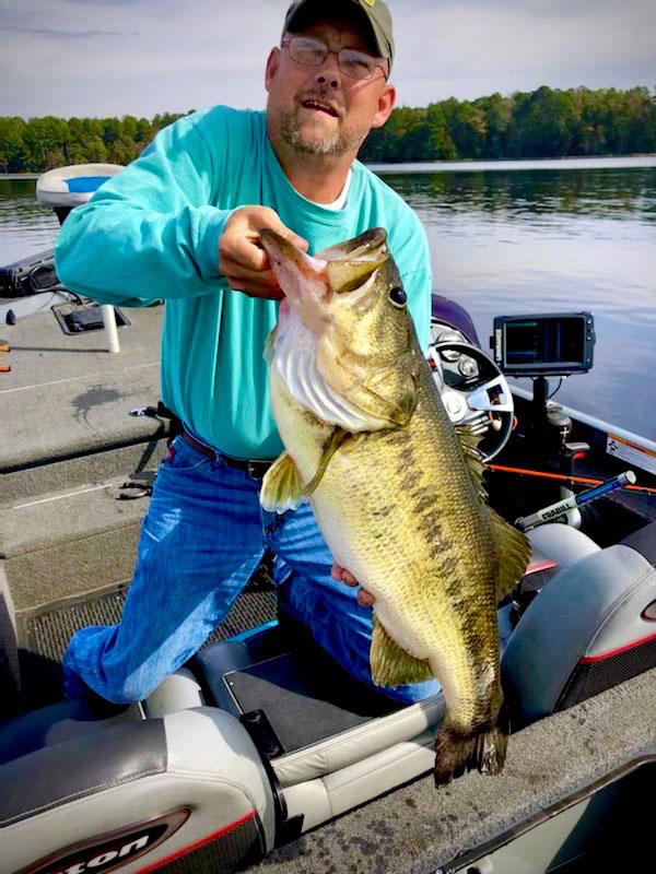 David Walsworth caught this 11.88 lunker largemouth in Caney Lake using a small Wing Ding lure. 