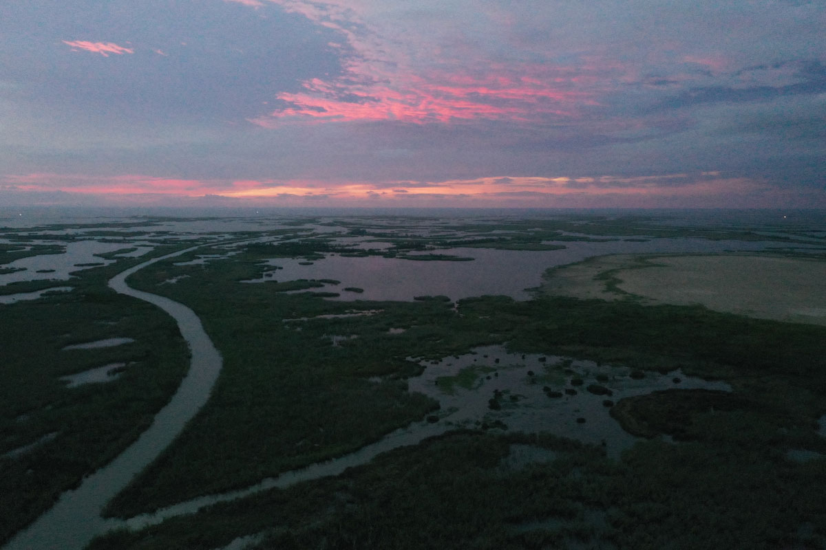 Sunrise at Pass-a-Loutre WMA, which celebrates its 100th birthday in November of 2021. (Photo courtesy LDWF)
