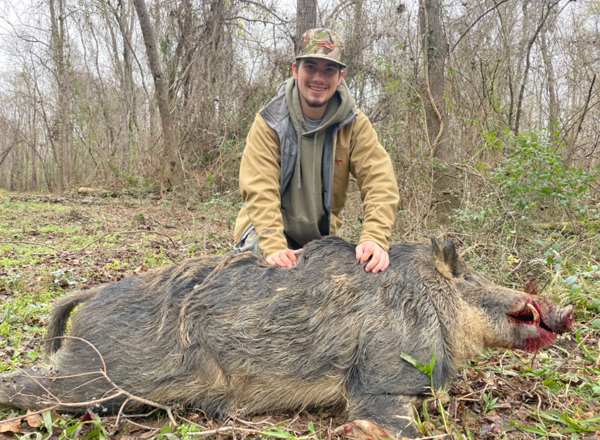 Ashton Corcoran nailed this 260-pound wild hog while deer hunting in Washington Parish this season.