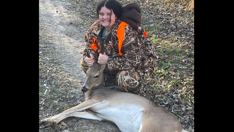 Hallie Crawford with a deer she took on Jan. 18, 2022 at a friend's property in Gilbert, Louisiana.