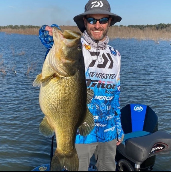 Randy Howell with his Bussey hawg, a 12-pound, 14-ounce lunker that was big bass of the tournament, his personal best and a new Bussey Lake record. (Photo courtesy Randy Howell Fishing)