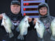 Matthew, right, and Bruce Rogers with four of the 3-pound plus Grenada crappie that helped them to the Crappie Masters Championship. (Photo courtesy Blake Jackson)