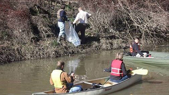 LDWF Staff and Volunteers assist in a litter clean-up in Dawson Creek behind LDWF Headquarters in Baton Rouge. (Photo courtesy LDWF)