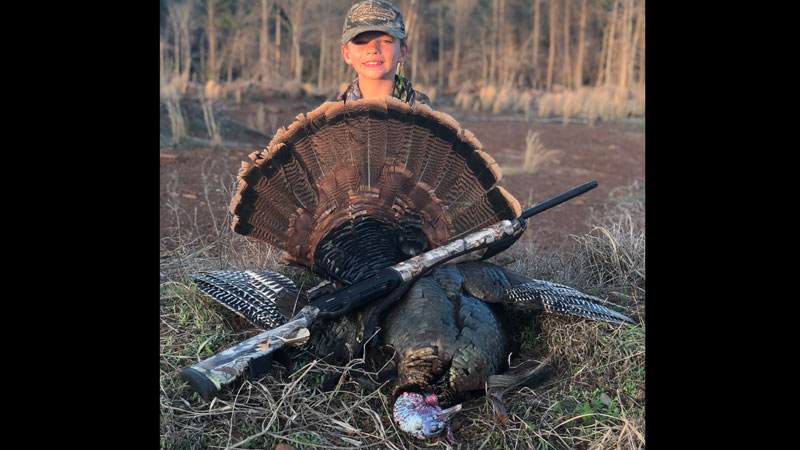 Hagan Michael Hay, 8, killed his first turkey in Claiborne Parish on a hunt with his father, Mark Hay, on March 26, 2022 It was the opening evening of youth turkey season.