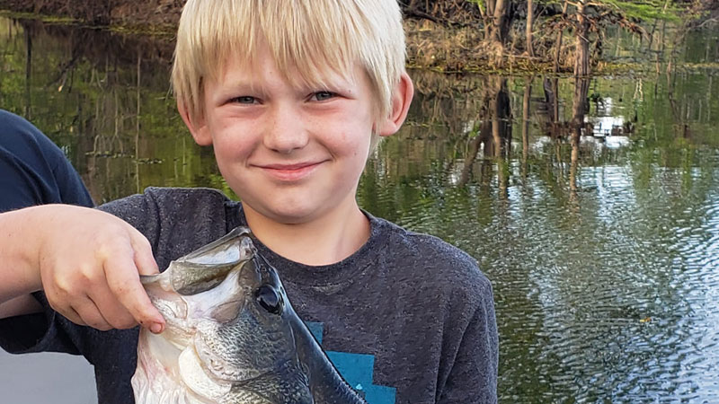 Bentley Packard, 9, of Sibley with his first 5-pound-plus bass caught on Bayou Dorcheat in Northwest Louisiana. It weighed 5 pounds 4 ounces.