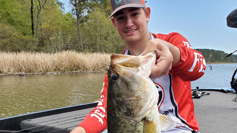 Justin Blais, 14, caught this 5.98-pound bass at Indian Creek while fishing a high school tournament.
