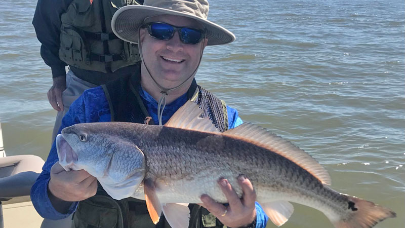 This nice red was caught by Addison Petitpain on March 2, 2022 while fishing with his daughter Camille Petitpain, 18, son Jacob Petitpain, 13, and father-in-law Bob Wack.