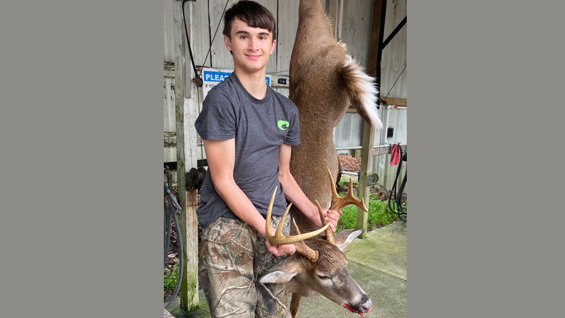 Kevin Bovia with the 9-point buck he harvested on Dec. 31, 2021 in Pearl River.
