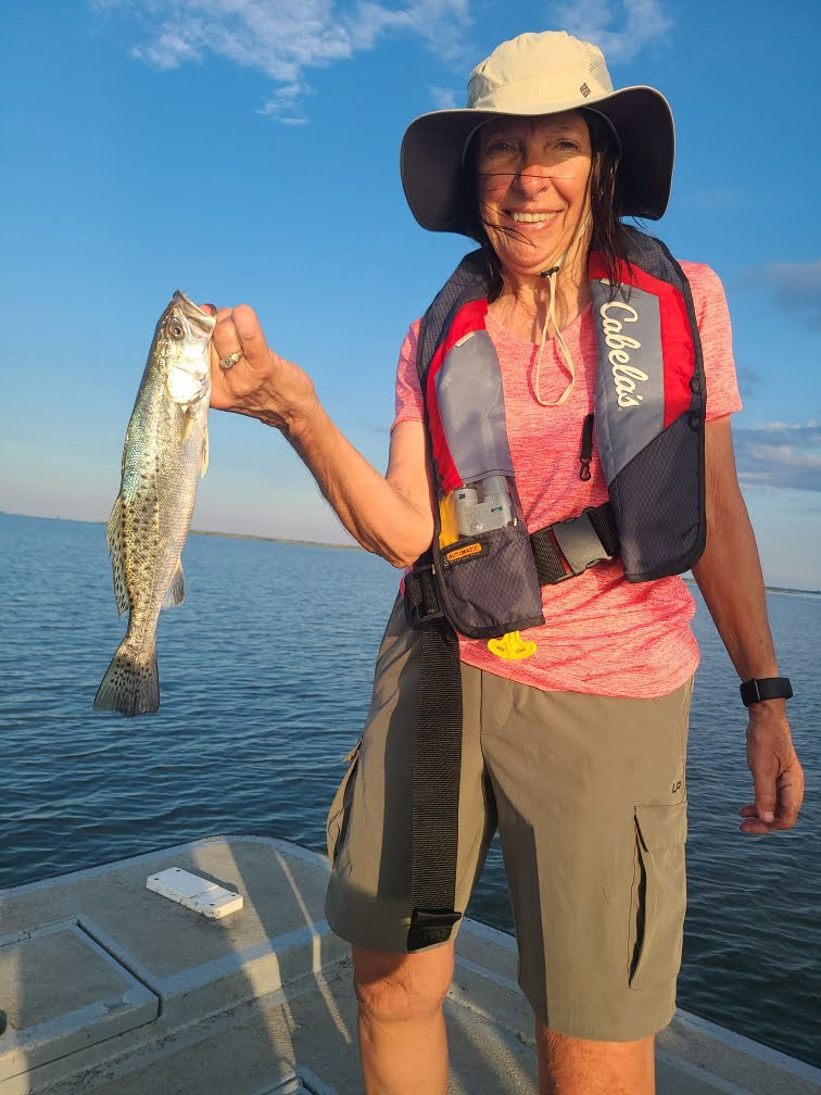Participant Tammy McDavid poses with her speckled trout she successfully landed. (Photo courtesy LDWF)