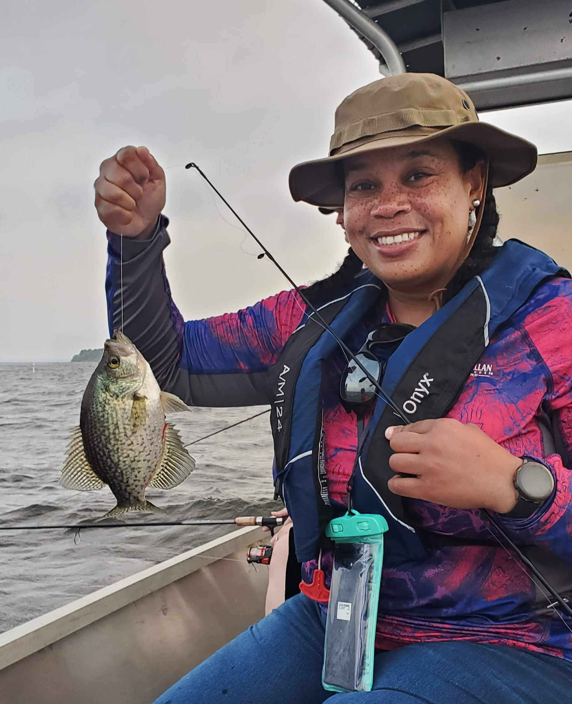 Participant Prisca Zeigler holds a black crappie caught during the Toledo Bend workshop. (Photo by LDWF)