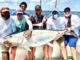 Team Tuna and their monster yellowfin tuna that weighed almost 250 pounds.