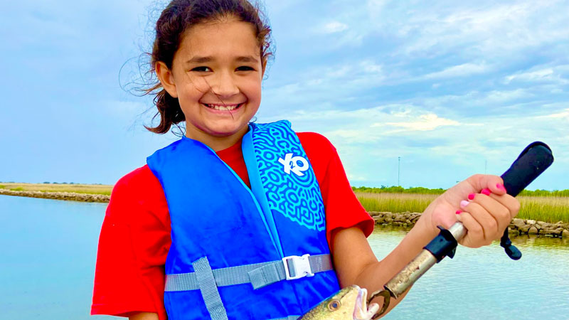 Ashton Goodly caught her first redfish, hooked and hauled in all by herself, on July 22 at Joseph Harbor in Rockefeller Wildlife Refuge.