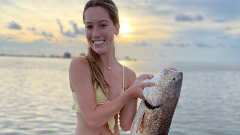 Ali Theriot from St. Martinville caught her first redfish on June 29, 2022 in Grand Isle.