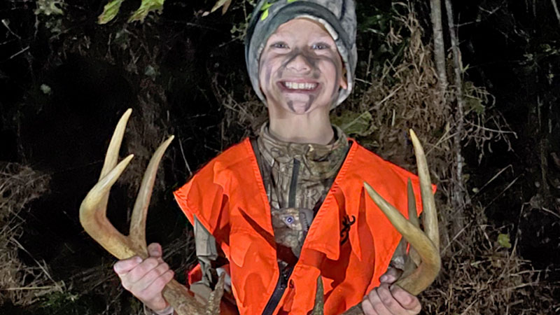 Jase LeBlanc with his first whitetail harvest at age 7 on his family farm in Claiborne, Miss.