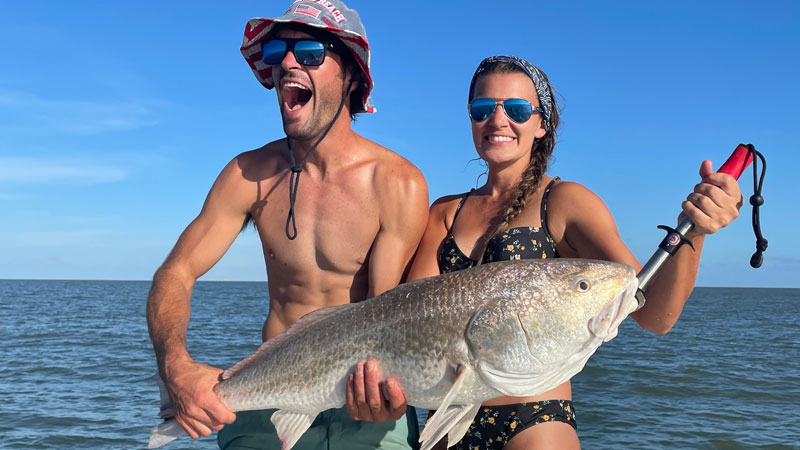 Jacob and Laken with a bull red