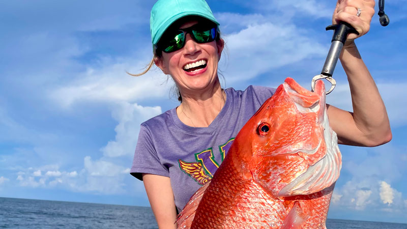 Donna O’Brien with an 18-pound red snapper caught out of Port Fourchon on July 4, 2022.