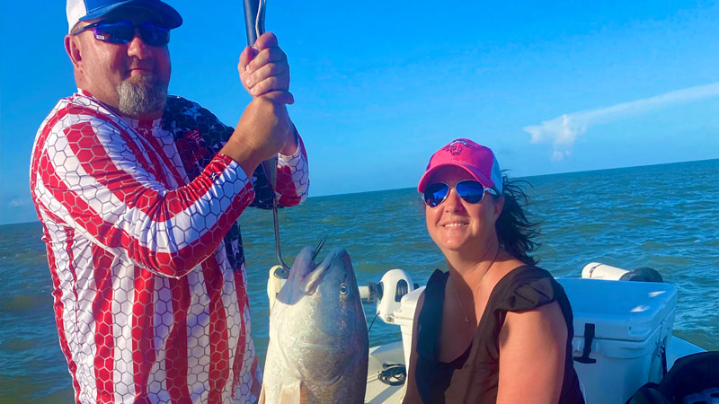Jessica Hungerford and her first bull red, 40 inches, caught at the Cameron jetties on June 3, 2022.