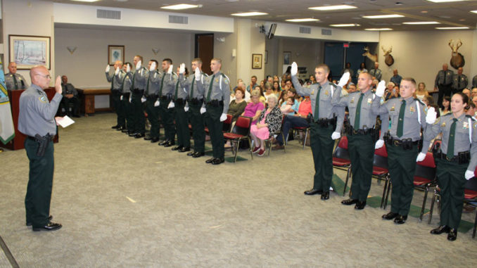 Col. Chad Hebert reading the Oath of Office to the graduation class. (Photo courtesy LDWF)