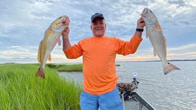 Bubba Himel with two Dulac redfish caught on a 1/4-ounce jig head and a Shrimp Creole Matrix slow retrieved.