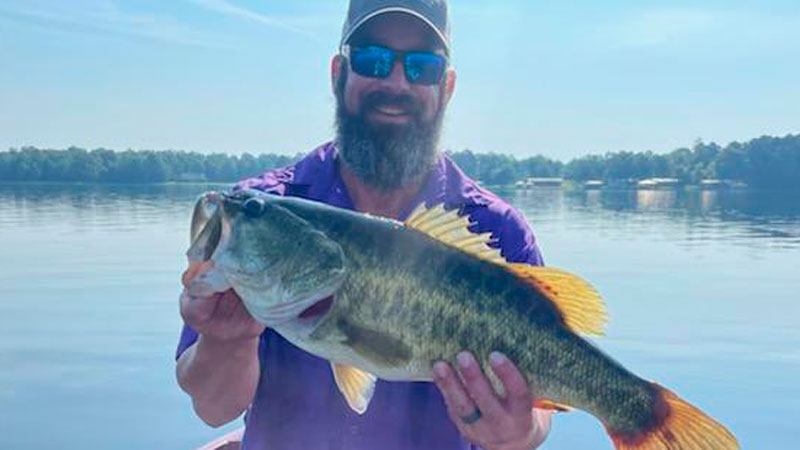 Seth Gaubert of Jonesboro with a bass caught at Caney Lake on June 21, 2022.