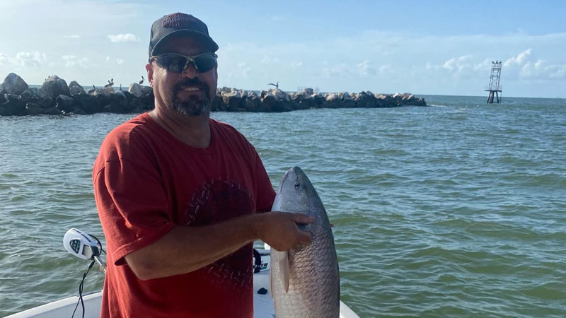 Larry Lute, a central Arkansas resident, landed a 37-inch redfish by the Cameron jetties on his first trip to Southwest Louisiana.