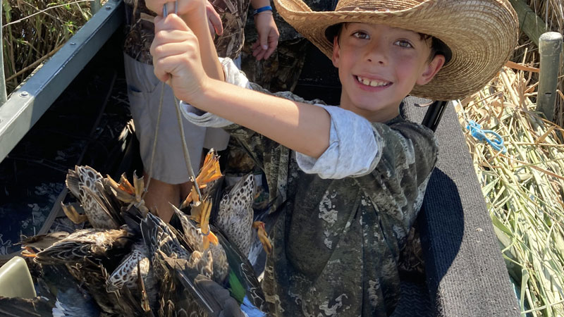 Joey Sampson, 8, from Ponchatoula, went teal hunting with his father and grandfather in Buras with guide service Cajun Fishing Adventure.