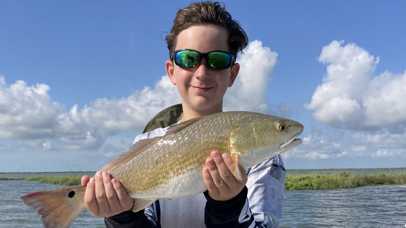 John Sampson, 11, from Ponchatoula was fishing in Buras with his father and Capt. Todd from Cajun Fishing Adventure when he landed this beautiful redfish on Sept. 9, 2022.