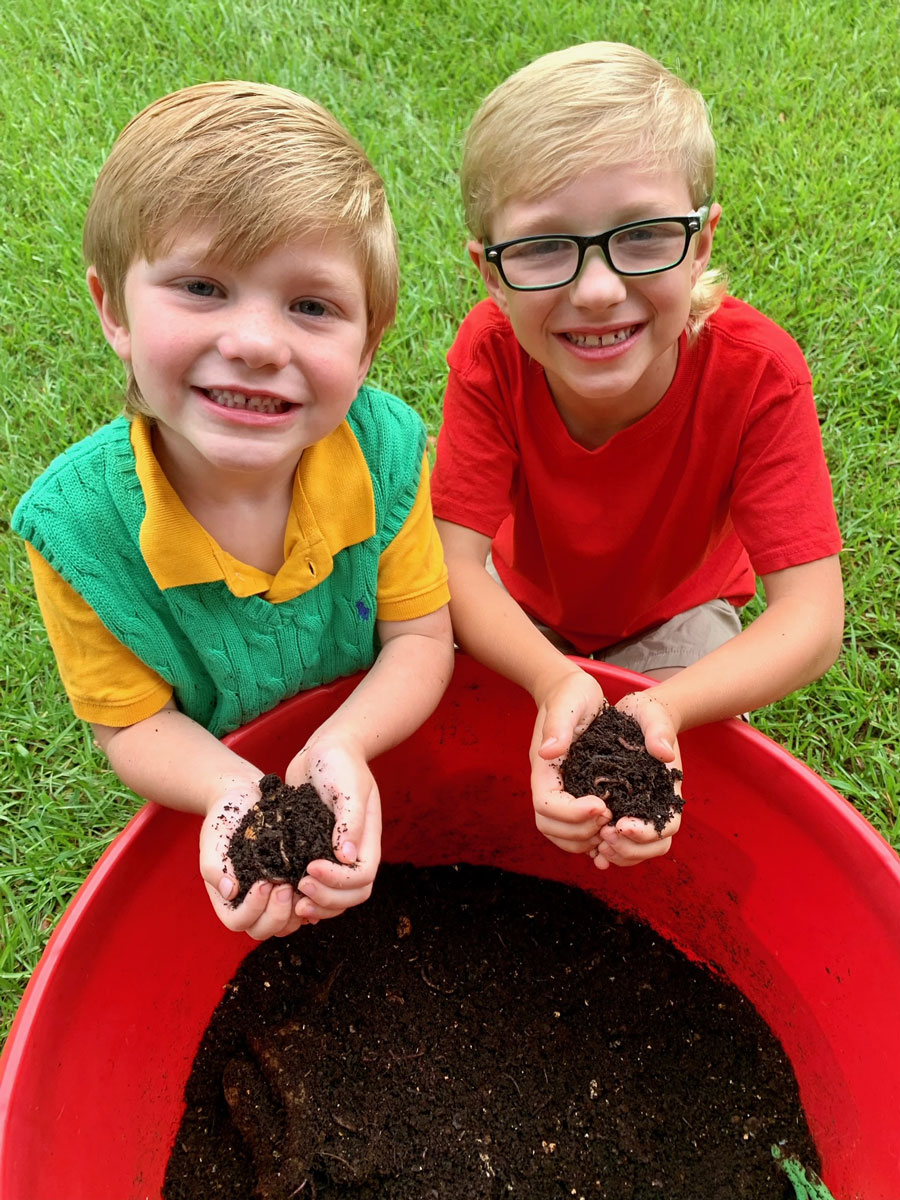 Cole Burton, 5, (left) and Clay Burton, 7, started raising worms to fish with and now they’ve gone in to business.