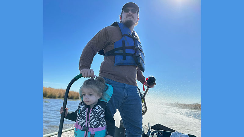 Daddy and daughter fishing