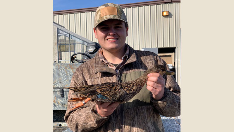 Jacob Stockstill shoots banded duck